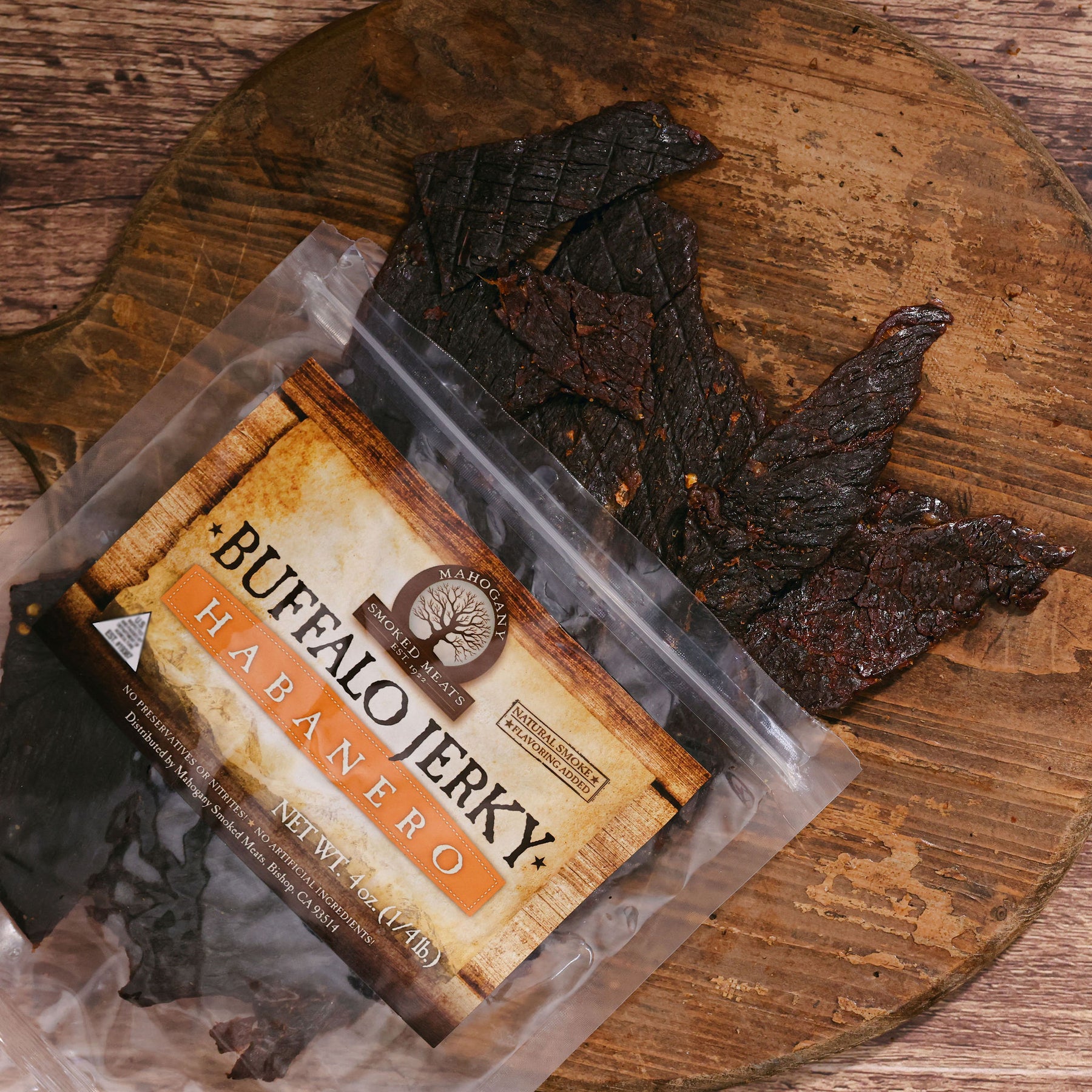 Packaged Buffalo Habanero jerky on an aged wooden surface