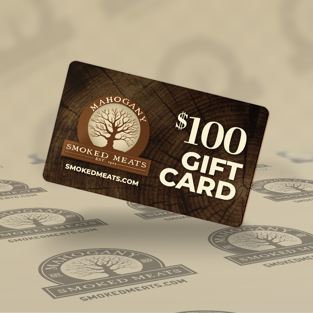 $100 gift card for Mahogany Smoked Meats on a wood grain background